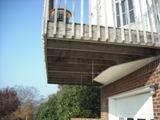 Deck nailed to house, how long before it falls?